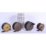 A SET OF FOUR RARE ANTIQUE MINIATURE FISHING REELS. Largest 6 cm wide. (4)