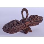 A GOOD 19TH CENTURY CONTINENTAL CARVED FRUIT COQUILLA NUT SNUFF BOX with double ends. 15 cm x 4 cm.