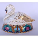 Royal Crown Derby paperweight of a swan, gold stopper, boxed. 9.5cm high