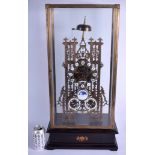 A VERY LARGE CONTEMPORARY BRASS SKELETON CLOCK enamelled with moon phase. 65 cm x 30 cm.