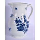 18th c. Worcester mask jug decorated in blue with flowers and moths. 19 cm high