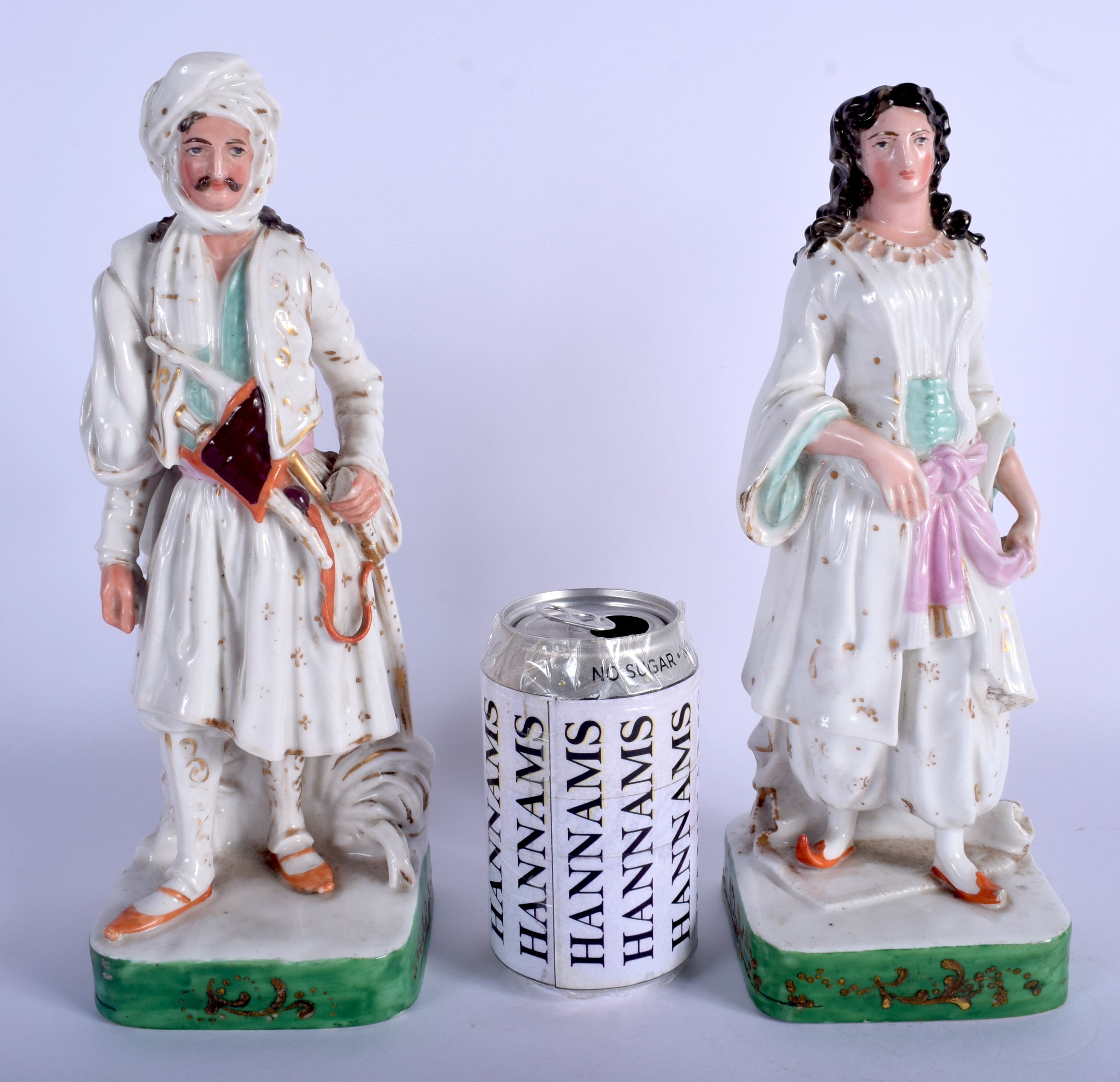 A LARGE PAIR OF 19TH CENTURY FRENCH JACOB PETIT PORCELAIN SCENT BOTTLES formed as an Eastern male an