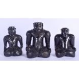 A VERY UNUSUAL SET OF THREE 19TH CENTURY CARVED HARDWOOD FIGURES modelled as Elizabethan style figur