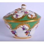 19th c. Paris porcelain oval box and cover painted with flowers in a shape raised gilt panel on an a