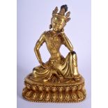 A CHINESE GILT BRONZE FIGURE OF A SEATED BUDDHA 20th Century, modelled upon a triangular base. 22 cm