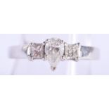 AN 18CT GOLD THREE STONE 0.75CT DIAMOND RING. 4.95 grams. S.