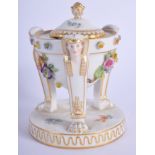 A 19TH MEISSEN PORCELAIN INKWELL AND COVER painted with flowers, formed with Egyptian revival mounts