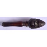 A RARE 19TH CENTURY CARVED RHINOCEROS HORN PIPE TAMPER formed as a males head, engraved with an anim