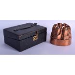 A VICTORIAN COPPER JELLY MOULD together with a jewellery box. (2)