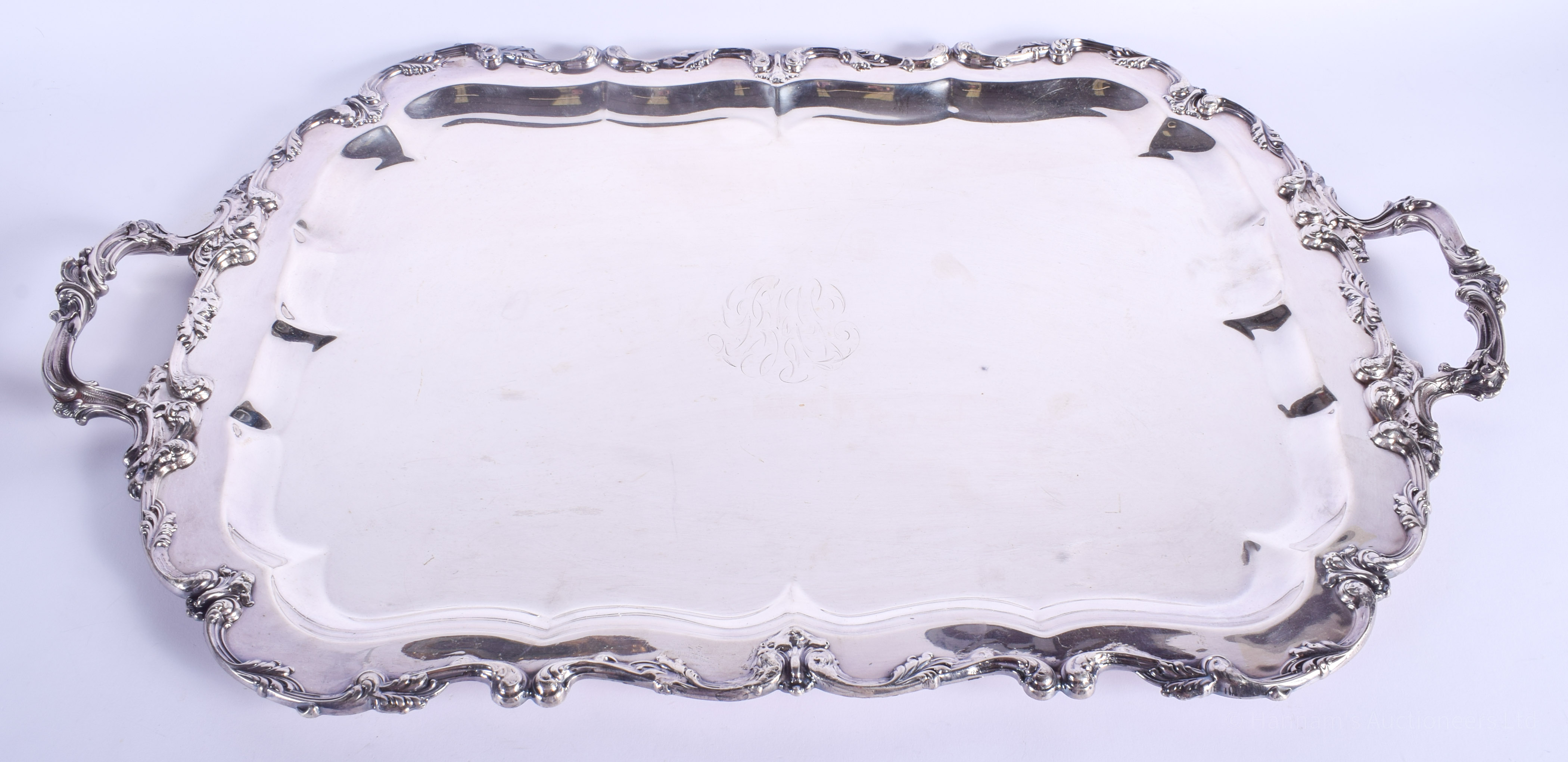 A LARGE AMERICAN GORHAM SILVER MOUNTED TWIN HANDLED TRAY with central monogram. 70 cm x 42 cm.