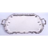 A LARGE AMERICAN GORHAM SILVER MOUNTED TWIN HANDLED TRAY with central monogram. 70 cm x 42 cm.