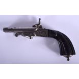 A MID 19TH CENTURY FRENCH SILVERED MUFF PISTOL decorated with foliage and vines. 14 cm wide.