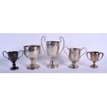 FIVE VINTAGE SILVER DOG TROPHIES including the Mooda Sparkle cup. 574 grams. (5)