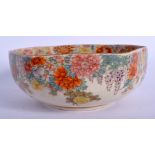 AN EARLY 20TH CENTURY JAPANESE MEIJI PERIOD SATSUMA BOWL painted with flower. 14 cm wide.