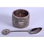 A CONTINENTAL SILVER NAPKIN RING and a Chinese silver spoon. 53 grams. (2)