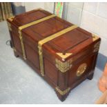 AN EARLY 20TH CENTURY CHINESE HARDWOOD AND BRASS BOUND TRUNK with camphorwood lining. 58.5 cm x 101