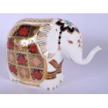 Royal Crown Derby paperweight of an elephant, gold stopper, boxed. 10.5 cm high.