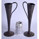 A PAIR OF FRENCH ART NOUVEAU PEWTER VASES by Jean Maurice Petizon. 32 cm high.