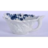 18th c. Worcester geranium moulded butter boat painted in blue with a large central flower and a tr