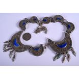 A MIDDLE EASTERN SILVER AND LAPIS LAZULI NECKLACE. 151 grams.