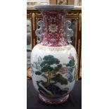 A LOVELY EARLY 20TH CENTURY CHINESE FAMILLE ROSE PORCELAIN VASE Late Qing, bearing Qianlong marks to