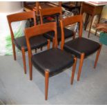 A SET OF FOUR SVEGARDS MARKARYD SWEDISH RETRO DINING CHAIRS with leather seats. 77 cm x 45 cm.