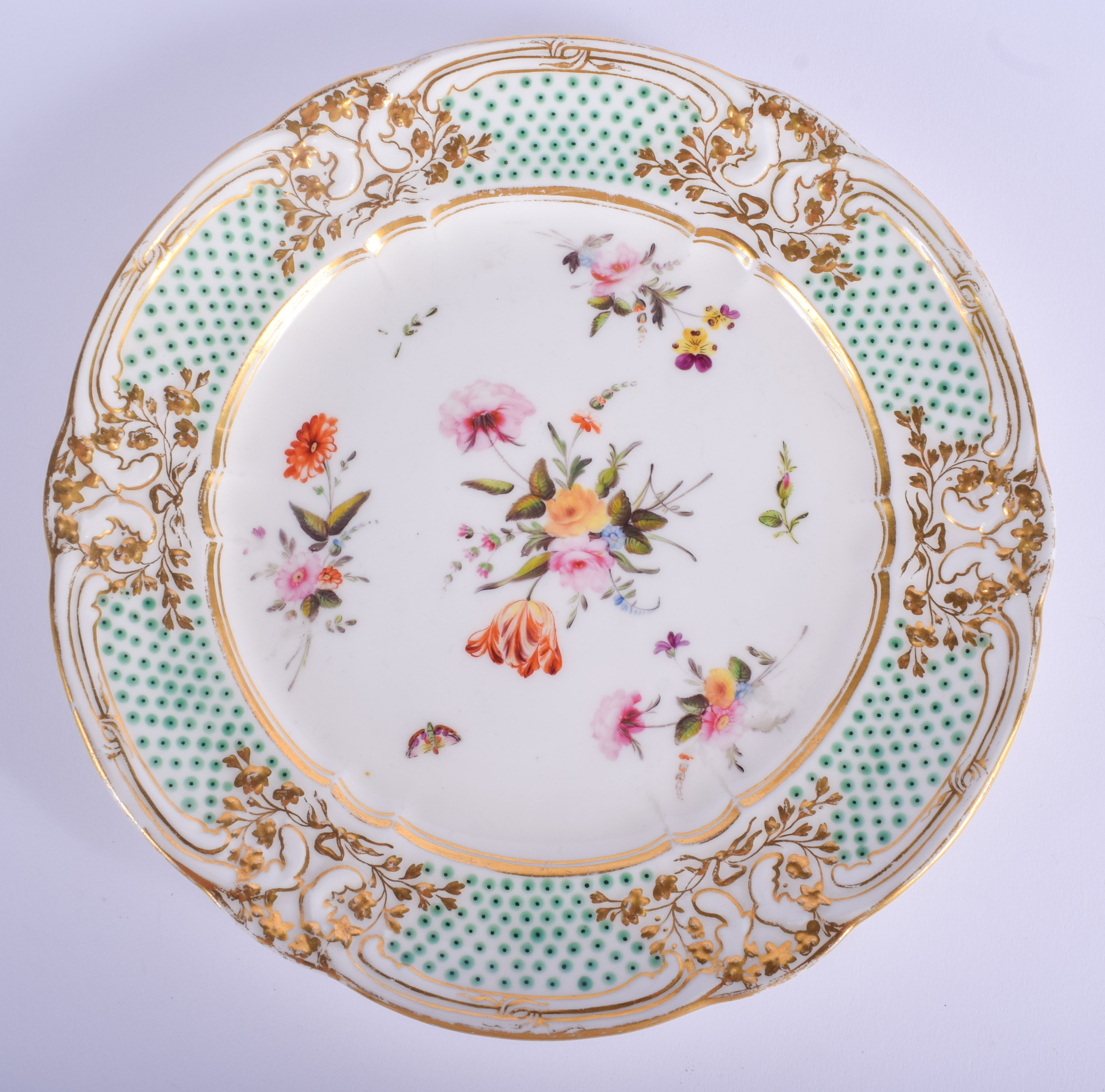 A GOOD EARLY 19TH CENTURY WELSH NANTGARW PORCELAIN PLATE possibly by Thomas Pardoe, painted with flo