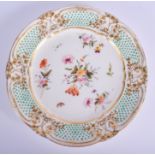 A GOOD EARLY 19TH CENTURY WELSH NANTGARW PORCELAIN PLATE possibly by Thomas Pardoe, painted with flo