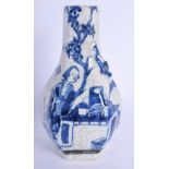 A 19TH CENTURY CHINESE BLUE AND WHITE PORCELAIN VASE painted with a figure within a landscape. 21 cm