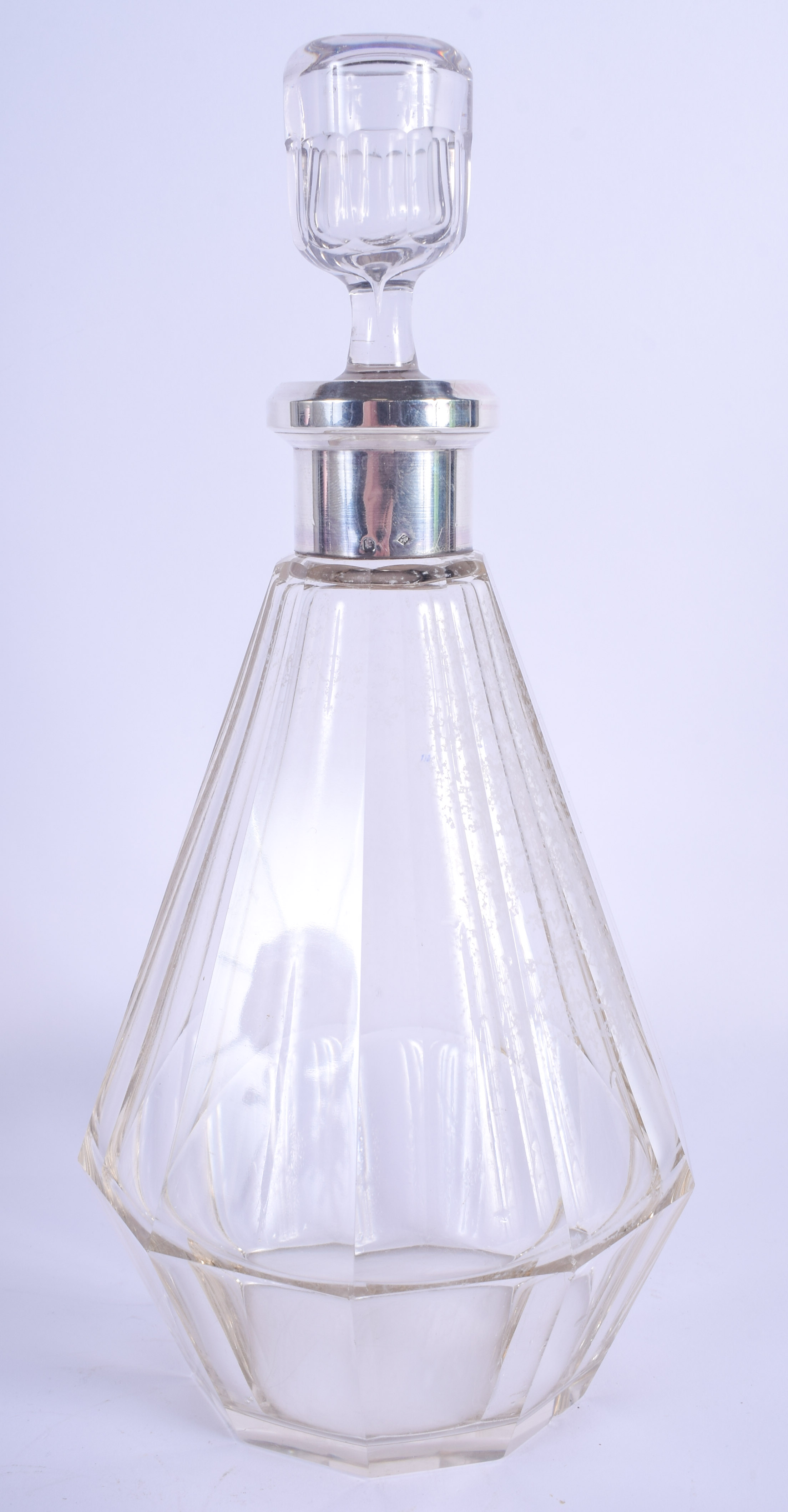 AN ART DECO SILVER MOUNTED DECANTER AND STOPPER. 30 cm high.