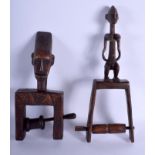 TWO AFRICAN TRIBAL CARVED WOOD PULLEYS. Largest 31 cm x 11 cm. (2)