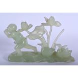 AN UNUSUAL EARLY 20TH CENTURY CHINESE GREEN JADE FIGURE OF A BOY modelled beside two ducks. 20 cm x