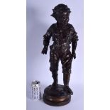 A LARGE 19TH CENTURY FRENCH BRONZE FIGURE OF A STANDING BOY modelled with one leg raised. 55 cm x 17