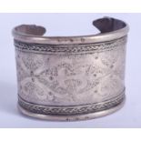 AN ANTIQUE TIBETAN SILVER CUFF BANGLE. 66 grams. 6.5 cm wide.