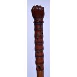 A LOVELY 18TH/19TH CENTURY CARVED COQUILLA NUT SAILORS FIST SWORD STICK with bamboo shaft. 91 cm lon