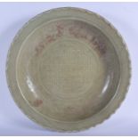 A 17TH/18TH CENTURY CHINESE CELADON SCALLOPED BARBED DISH Ming/Qing. 41 cm wide.