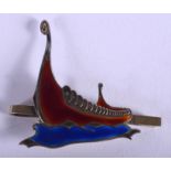 A NORWEGIAN SILVER AND ENAMEL VIKING BOAT BROOCH. 11.3 grams. 6 cm x 5.5 cm.