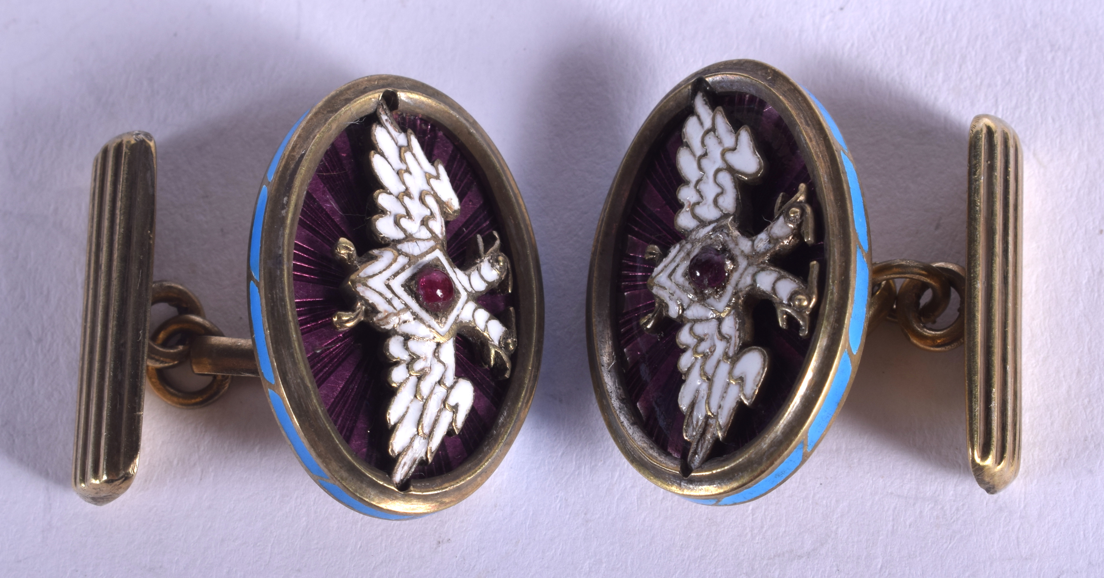 A PAIR OF CONTINENTAL JEWELLED SILVER GILT CUFFLINKS. 21 grams.