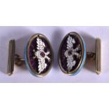 A PAIR OF CONTINENTAL JEWELLED SILVER GILT CUFFLINKS. 21 grams.