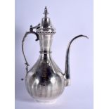 A GOOD LARGE MIDDLE EASTERN TURKISH SILVER EWER decorated with motifs, tughra mark. 1135 grams. 34 c