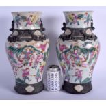 A LARGE PAIR OF 19TH CENTURY CHINESE CRACKLE GLAZED VASES Qing, painted with warriors within landsca