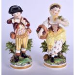 Late 19th c.\Early 20th c. Derby figures of a boy and girl he sniffing a flower, she with a basket o