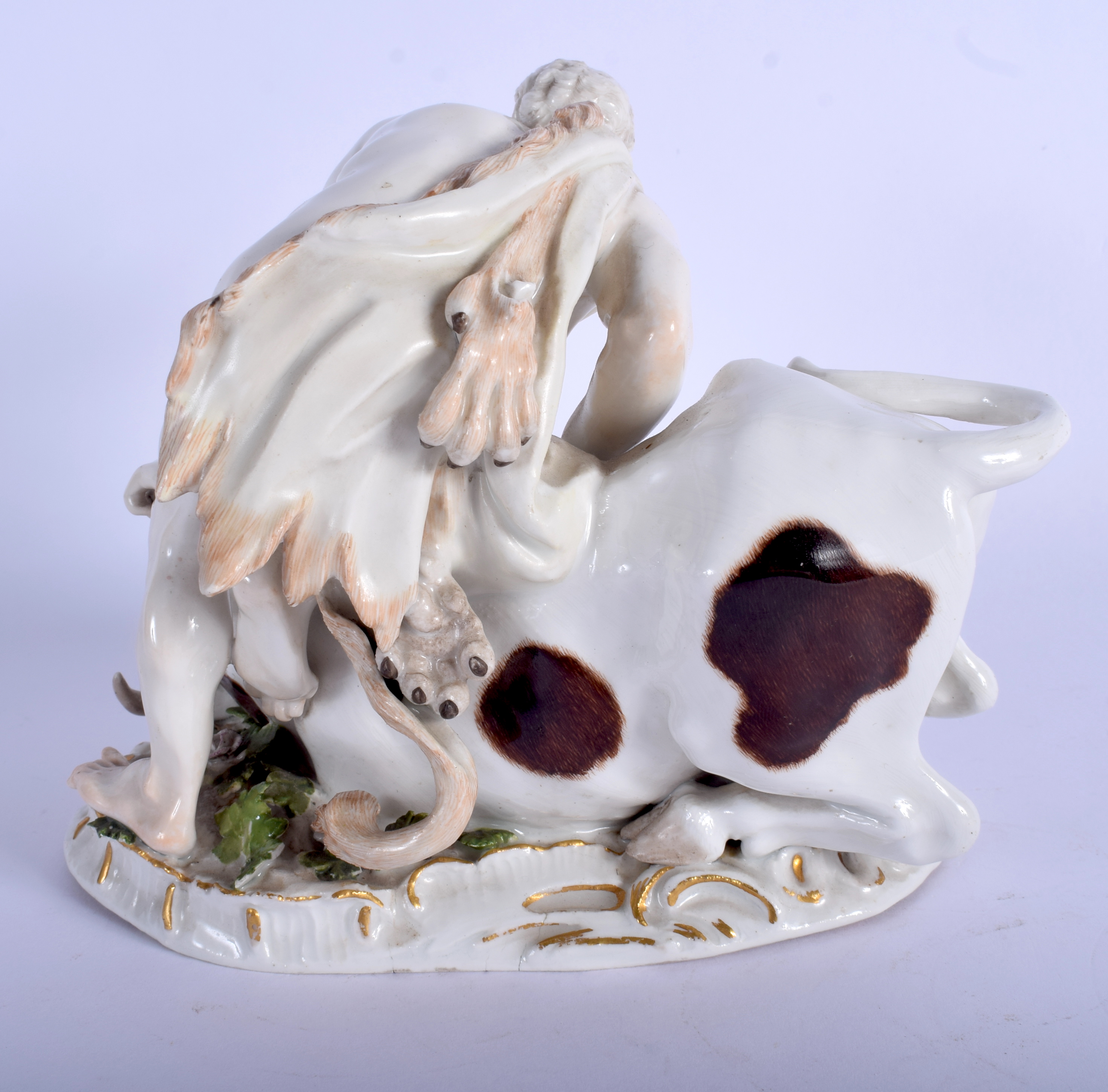 A LOVELY 19TH CENTURY MEISSEN PORCELAIN FIGURE OF A MUSCULAR MALE modelled taming a bull upon a natu - Bild 2 aus 3