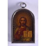 A 19TH CENTURY RUSSIAN SILVER AND LACQUERED ICON depicting a saint. 32.7 grams. 4 cm x 6.25 cm.