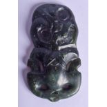 A FINE AND RARE MAORI PENDANT IN HUMAN FORM New Zealand, Hei Tiki, Greenstone/Nephrite Jade (possibl