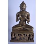 A LARGE 19TH CENTURY INDIAN BRONZE FIGURE OF A SEATED BUDDHA modelled with legs crossed upon a trian