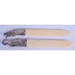 TWO SILVER MOUNTED PAGE TURNERS. 75 grams. 23 cm long. (2)