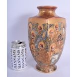 A 19TH CENTURY JAPANESE MEIJI PERIOD SATSUMA VASE painted with figures within landscapes. 26.5 cm hi