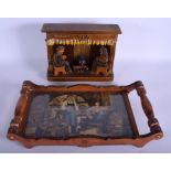 A 1930S BAVARIAN BLACK FOREST WISS WOOD DIORAMA together with a similar tray. Largest 45 cm x 25 cm.