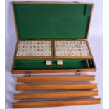 A VINTAGE CHINESE BOXED MAHJONG SET. Box 45 cm x 23 cm.
